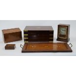 A group of mahogany objects, 19th - 20th centuries, comprising a brass bound writing slope with i...