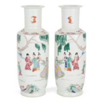 A pair of Chinese famille rose rouleau vases, Qing dynasty, 19th century, each painted with figur...