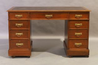 A Victorian mahogany pedestal desk, last quarter 19th century, leather writing surface above nine...