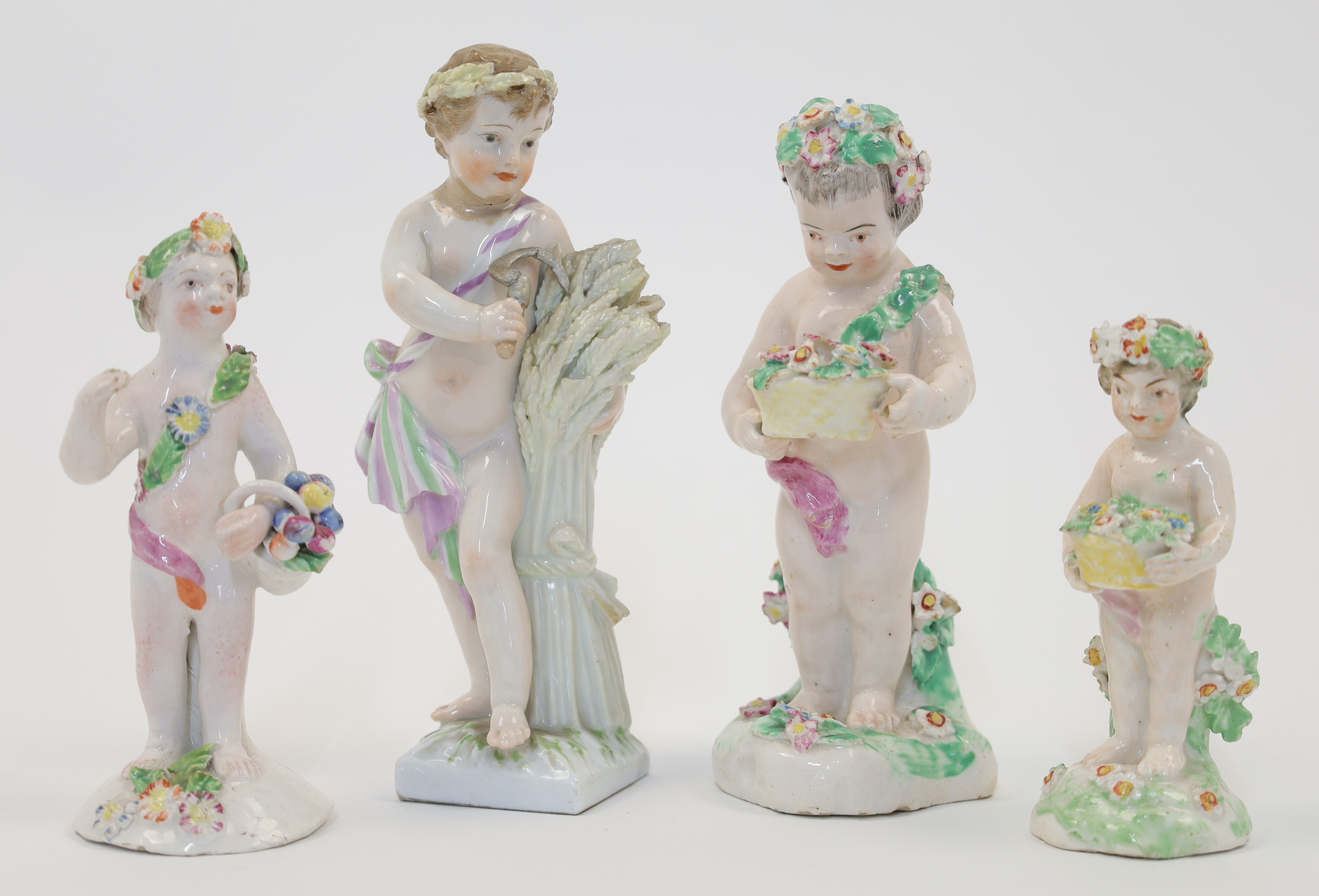 Four porcelain figures, 18th - 19th centuries, comprising: a Berlin (K. P. M.) figure of a boy ha...