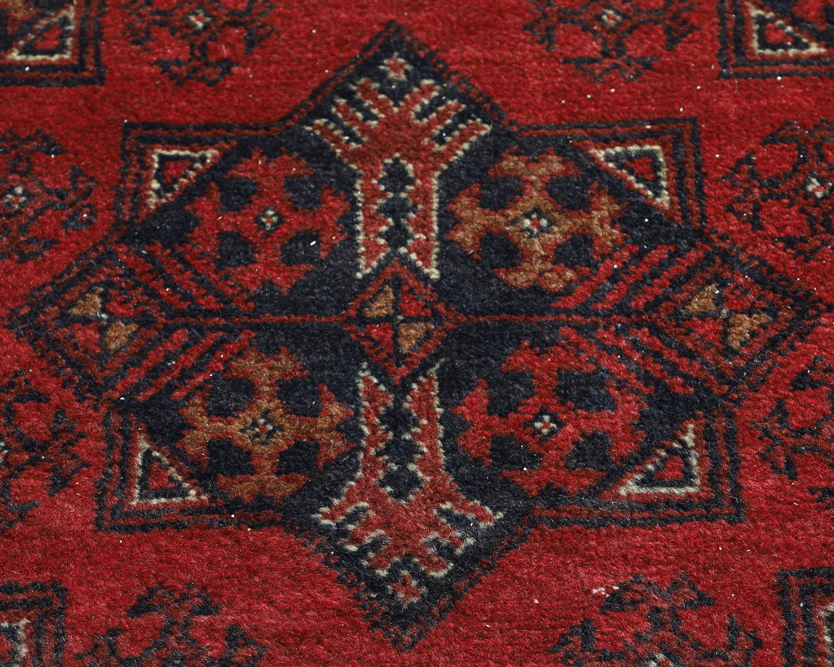 An Afghan Khal Mohammadi carpet, last quarter 20th century, repeating geometric motifs and border... - Image 3 of 4
