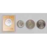 Four coins, to include a 1882 United States of America Morgan dollar, the obverse with profile of...