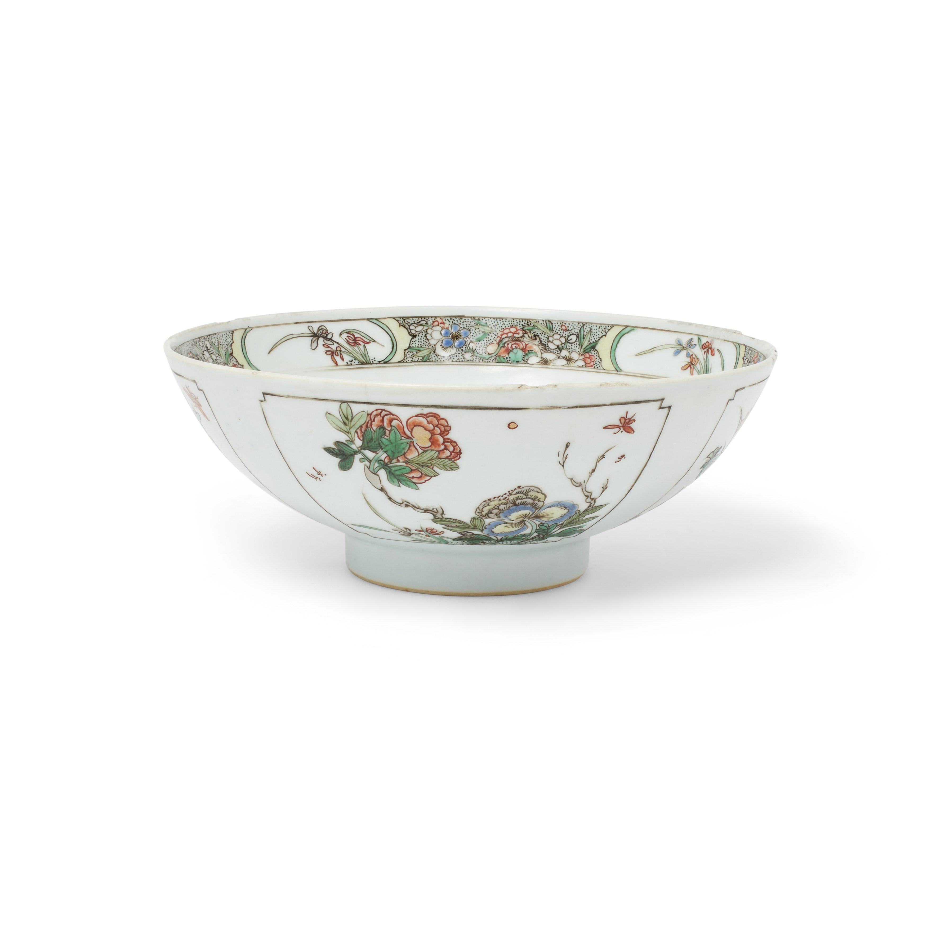 A Chinese famille verte 'floral' bowl, Qing dynasty, Kangxi period, enamelled and gilt to the ext...