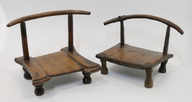 Two hardwood low chairs, African or Chinese provincial, 19th century, each with shaped rail on tw...