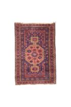 A Persian Zanjan rug, last quarter 20th century, geometric design on a blue and terracotta ground...