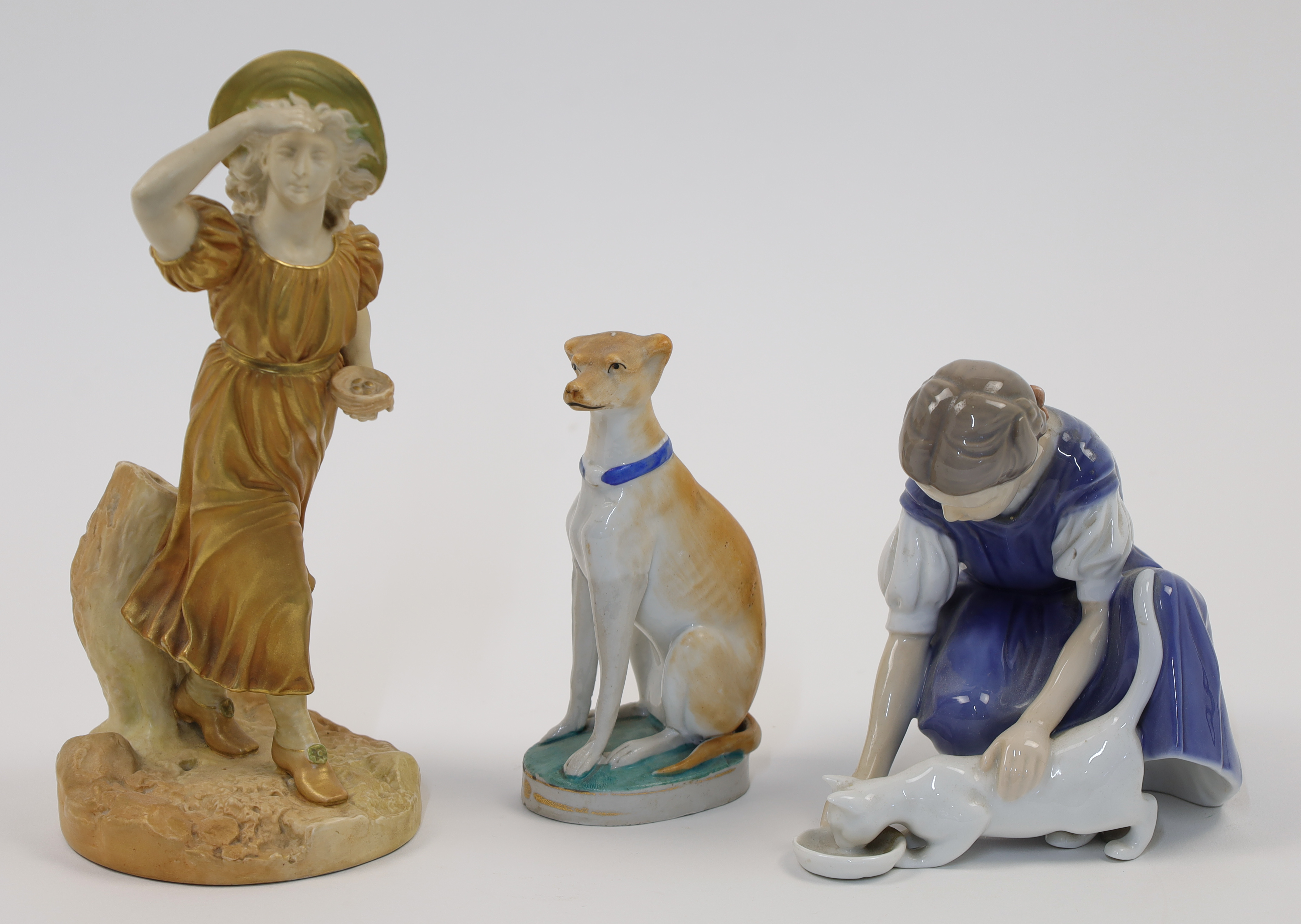 A group of decorative porcelain figures, 20th century, comprising: a Royal Worcester blush ivory ...