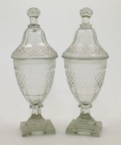 A pair of Regency style hobnail cut sweetmeat glass jars and covers, 20th century, each with knop...