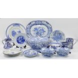 A quantity of blue and white transfer-print decorated ceramics, 19th century, comprising: a group...