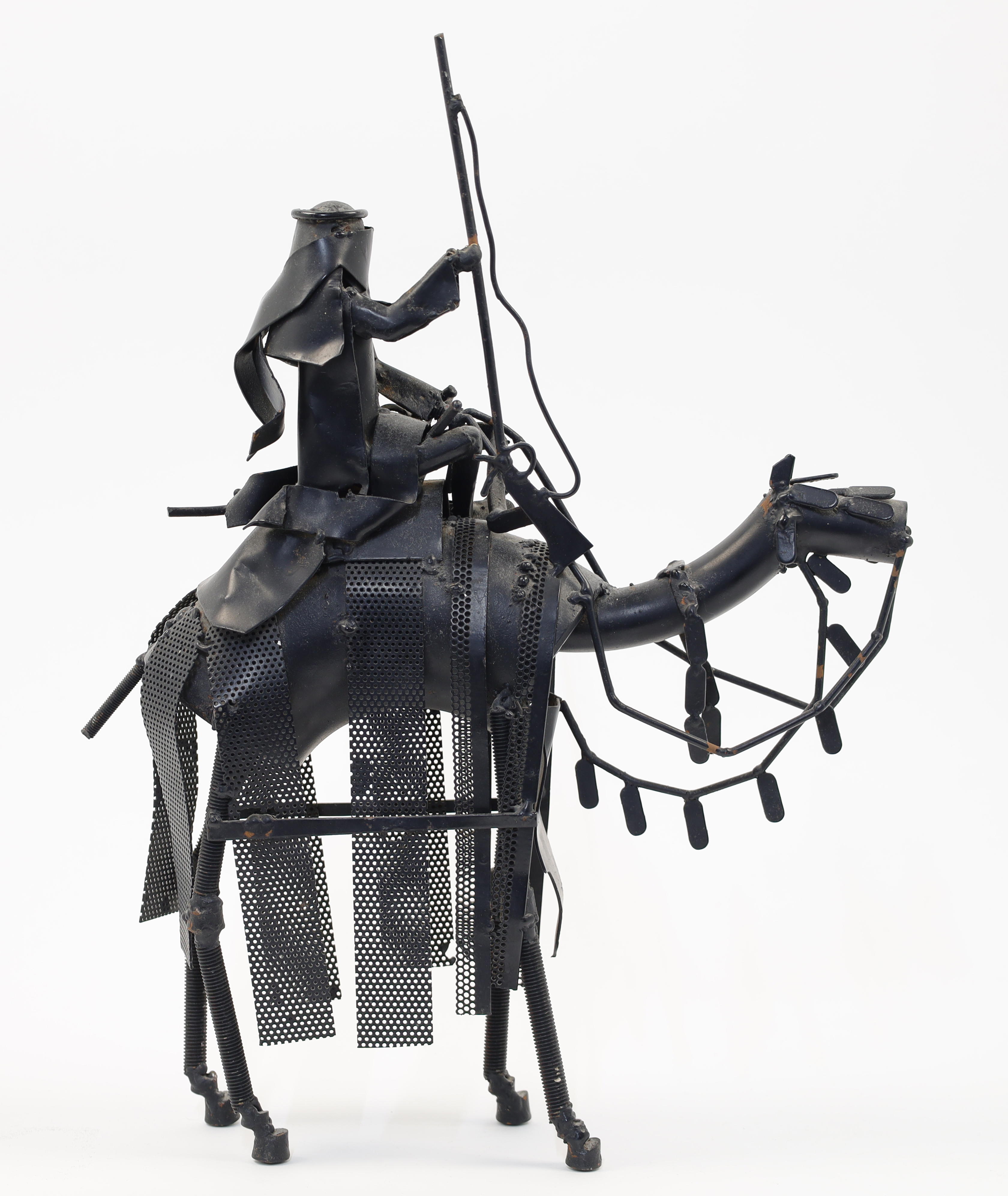 A metal sculpture of an Arab soldier with rifle riding a camel, 20th century, black painted tubul... - Image 2 of 2