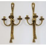 A pair of gilt-bronze three light wall appliques, second half 20th century, each with ribbon-tied...