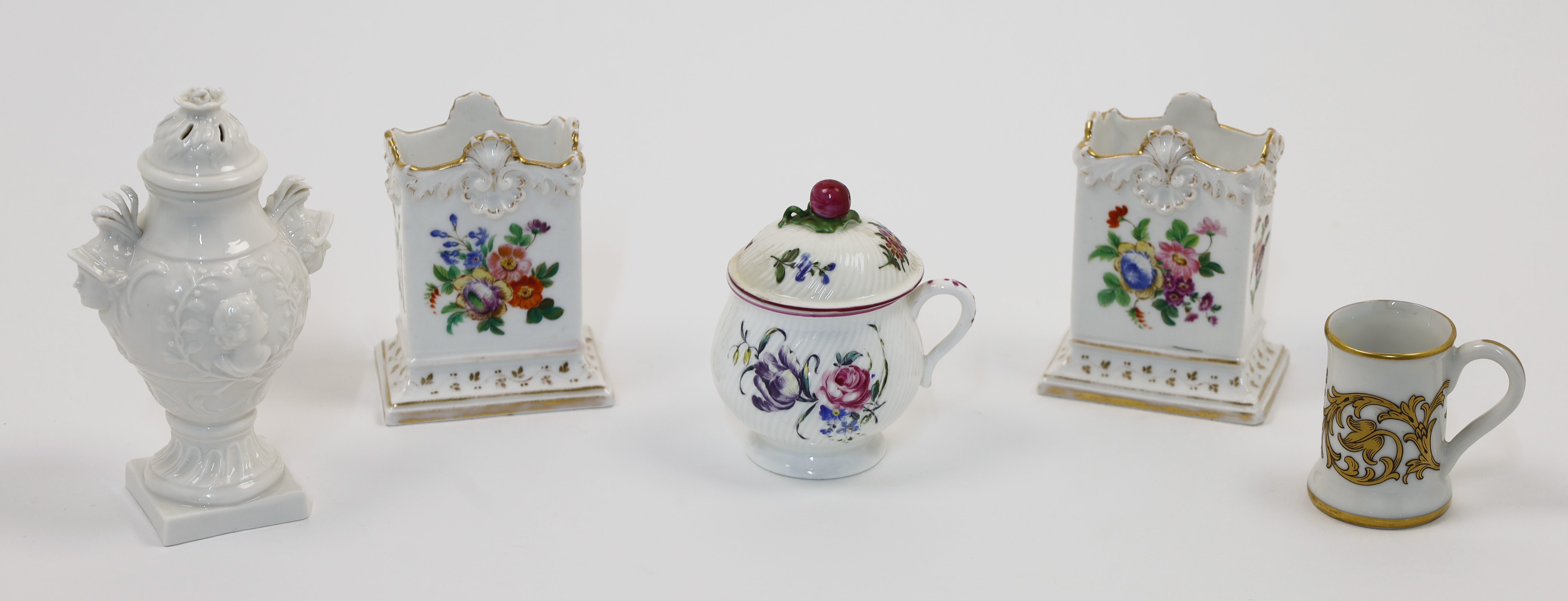 A group of Continental porcelain, to include a Mennecy pot à jus and cover, c.1760, incised D.V. ...