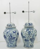 A pair of large Chinese blue and white baluster jars and covers converted to lamps, 20th century,...