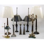 A group of various table lamps, 20th century, comprising: a pair of mahogany turned wood candlest...