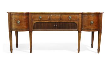 A Regency mahogany sideboard, first quarter 19th century, rosewood and brass inlaid, the rectangu...