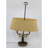 A French brass two light bouillotte lamp, 20th century, each acanthus leaf sconce with drip pan, ...