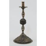 An Armenian silver repousse candlestick holder, Ottoman provinces, 19th century, on circular coni...