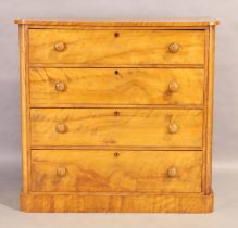 A Victorian satinwood chest, third quarter 19th century, with four drawers, on plinth base, 115cm...