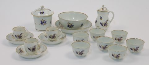A Worcester porcelain part tea service, c.1785, decorated with gilt-highlighted blue flowers and ...