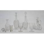 A group of cut glass decanters and goblets, 19th - 20th centuries, comprising: a quadrilobed deca...