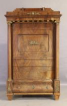 An Empire mahogany cabinet, first quarter 19th century, gilt metal mounted, the stepped and shape...