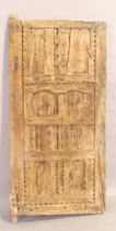 A Moroccan granary door, 18th/19th century, 122 x 62cm Provenance: Property from the estate of t...
