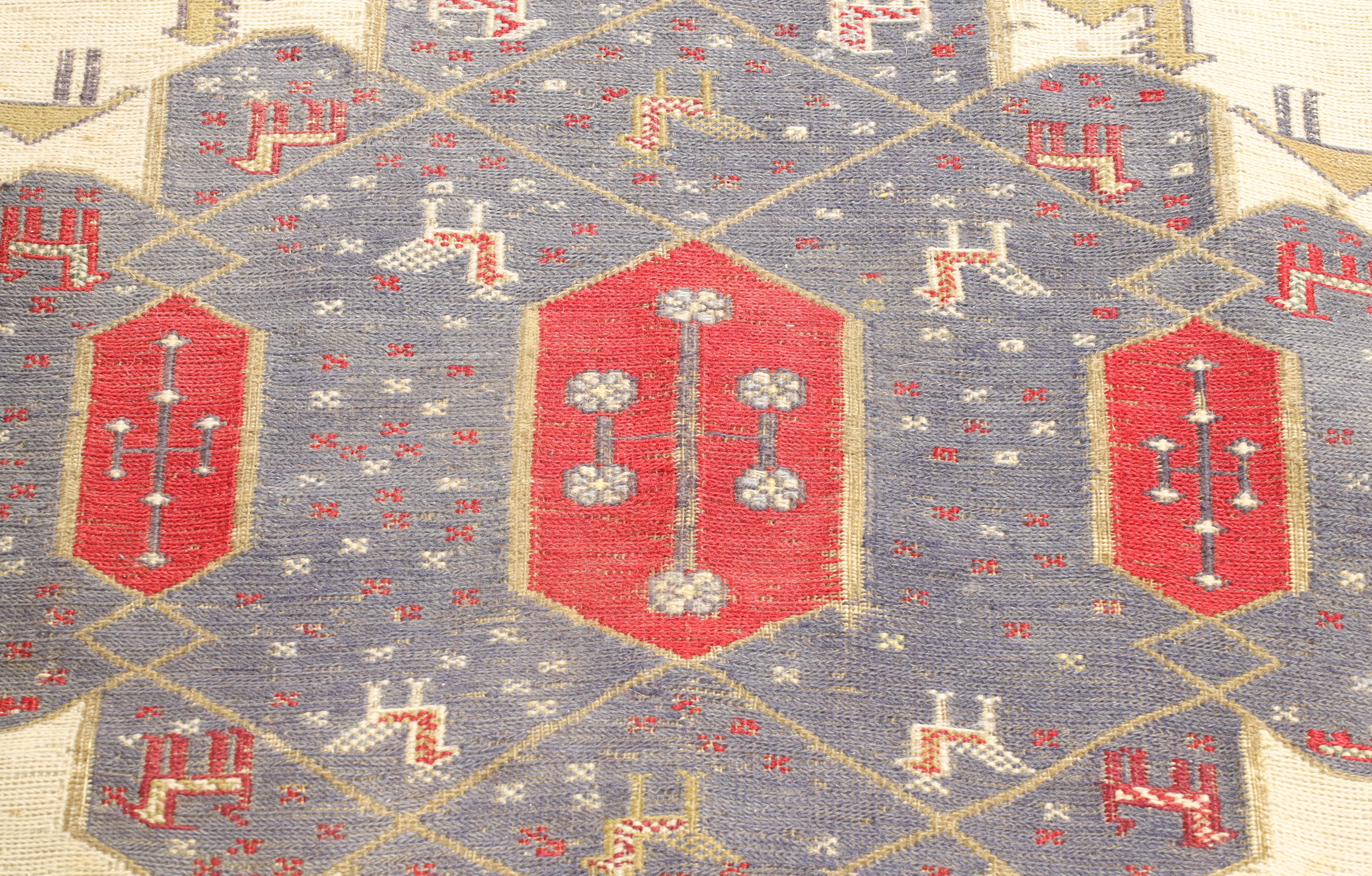 A Persian Ardebil flatweave rug, last quarter 20th century, with zoomorphic design, on a red and ... - Image 3 of 4