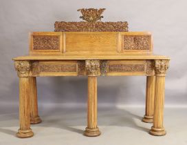 A Victorian carved light oak serving table, last quarter 19th century, the superstructure above c...