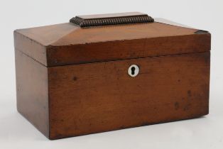 A late Georgian mahogany tea caddy, early 19th century, of rectangular form with sarcophagus lid ...