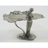 An Art Nouveau style silvered metal card tray, 20th century, modelled as a fairy holding a dove w...