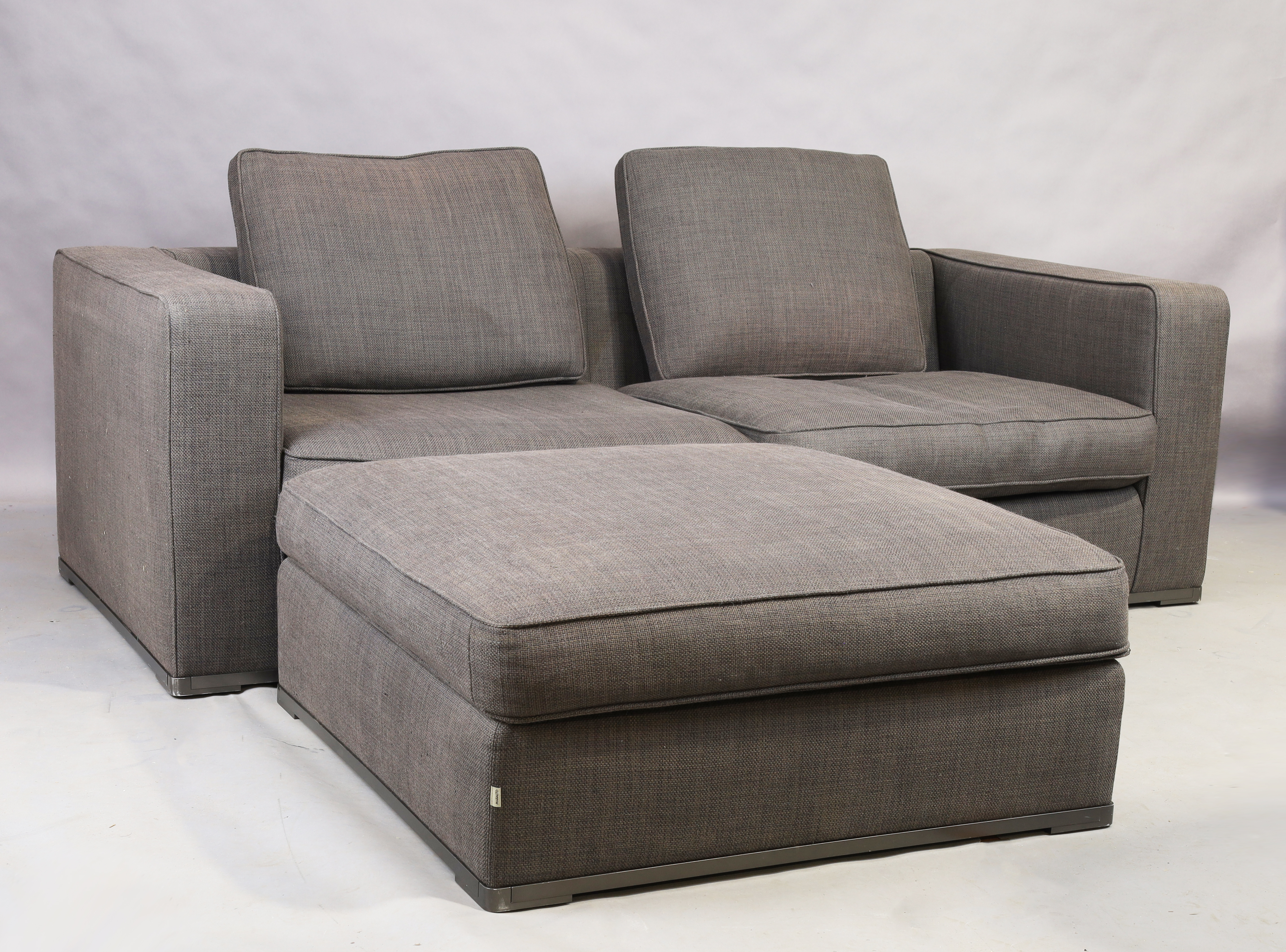 Antonio Citterio (b. 1950) for Maxalto, an 'Apta' two seat sofa with ottoman, c.2015, wool uphols...