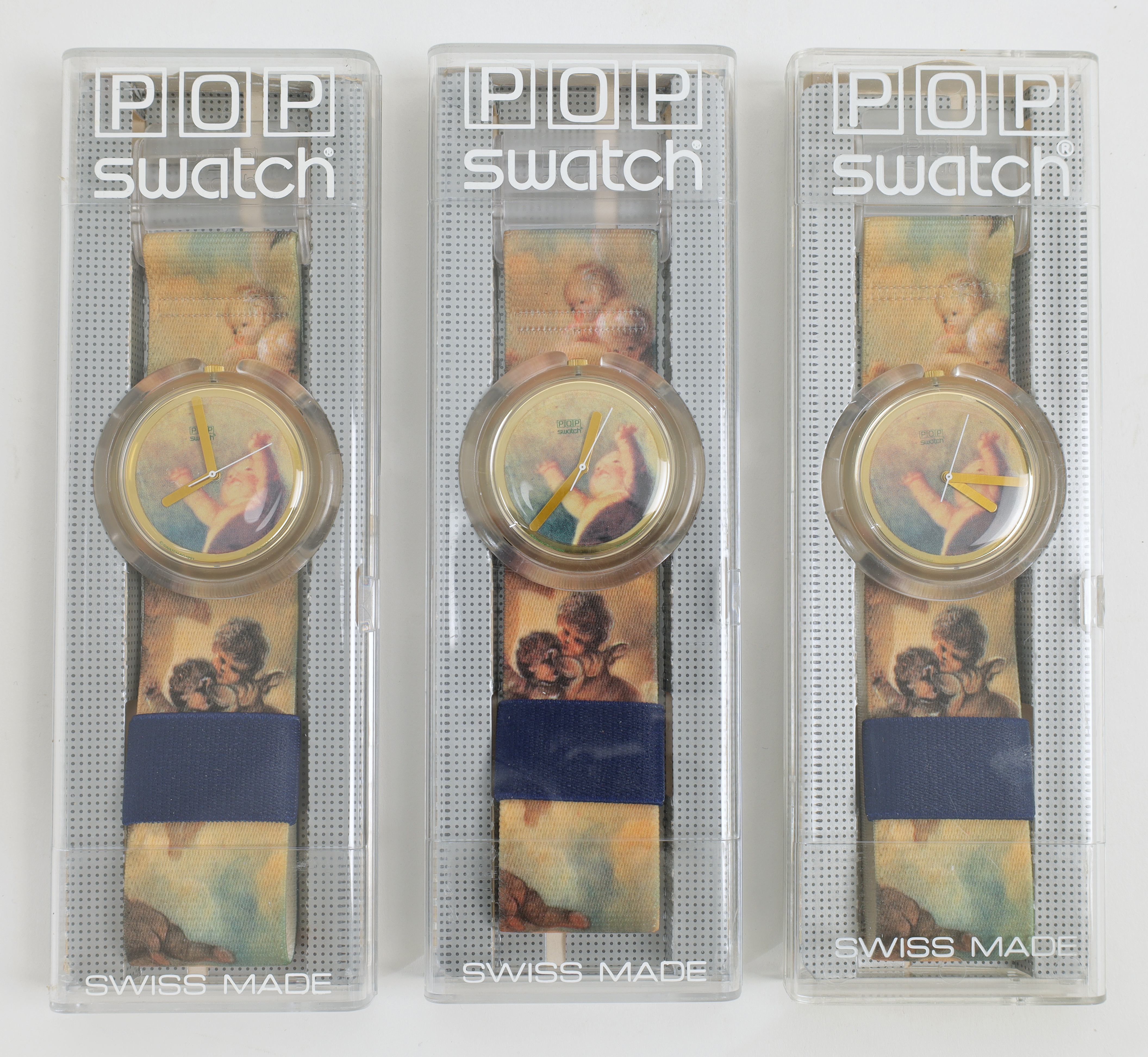 Vivienne Westwood (1941-2022) for Swatch, three 'Putti' pop watches, 1992, each housed in a plast...