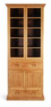 Edric van Vredenburgh, a large bookcase, late 20th century, solid teak, glass, 266cm high, 110cm ...