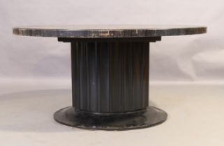 A modern ebonised dining table by Ralph Lauren, the oval top with sliding mechanism, on fluted su...