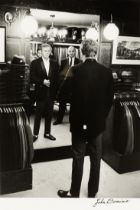 John Dominis, American 1921-2013, Steve McQueen’s Suit Fitting, 1963;  photographic print on ph...