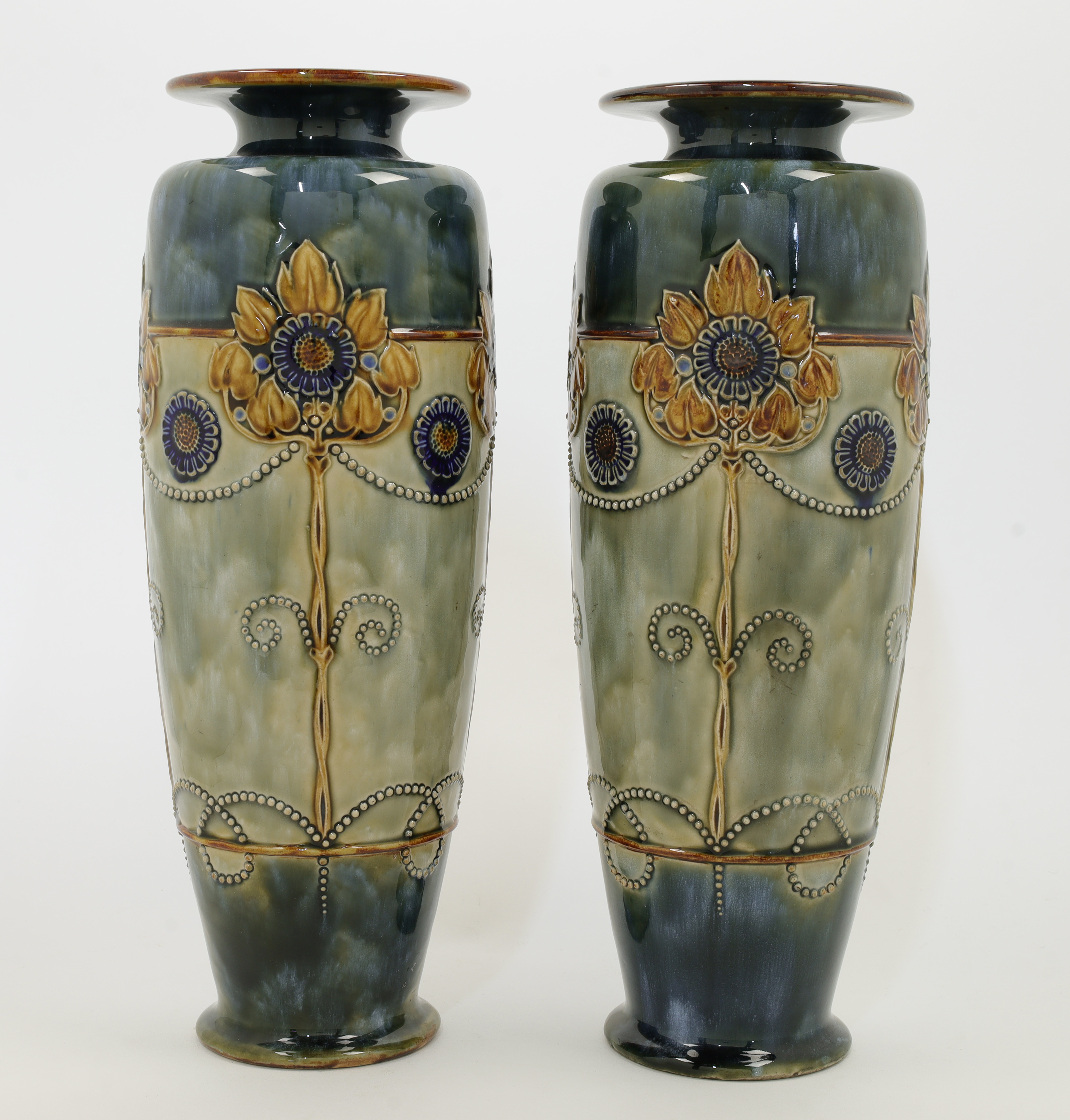 A pair of Doulton Lambeth stoneware vases, early 20th century, impressed lion and crown with Roya...