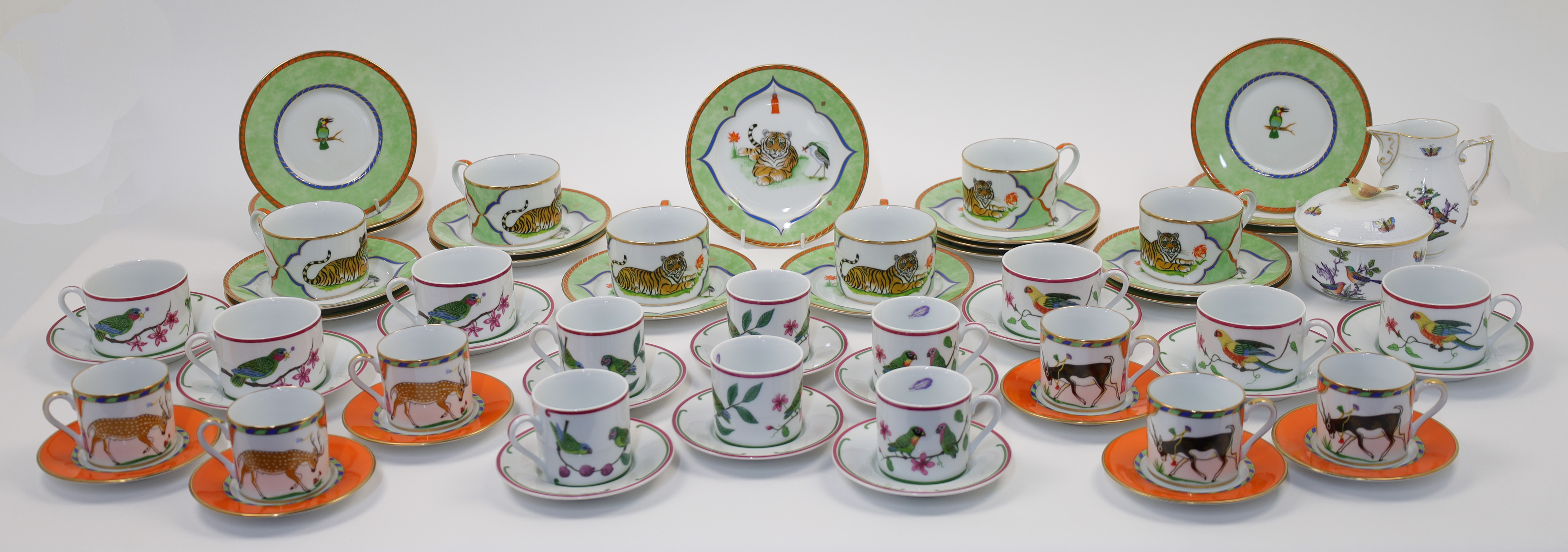 A group of Lynn Chase porcelain tea services, late 20th century, comprising: a 'Tiger Raj' patter...