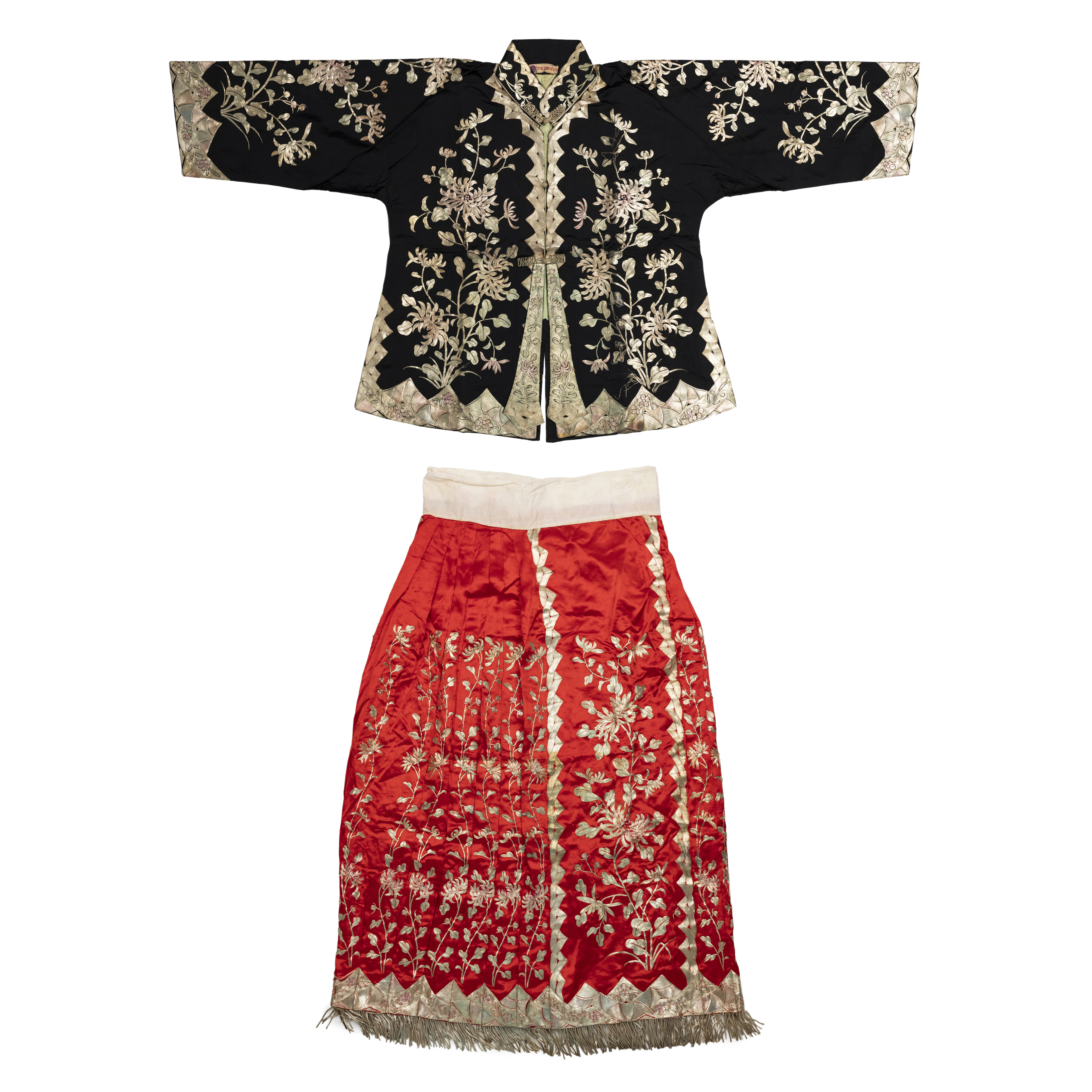 A Chinese embroidered wedding robe jacket and skirt 1930s Comprising a slim-sleeve jacket of bl...