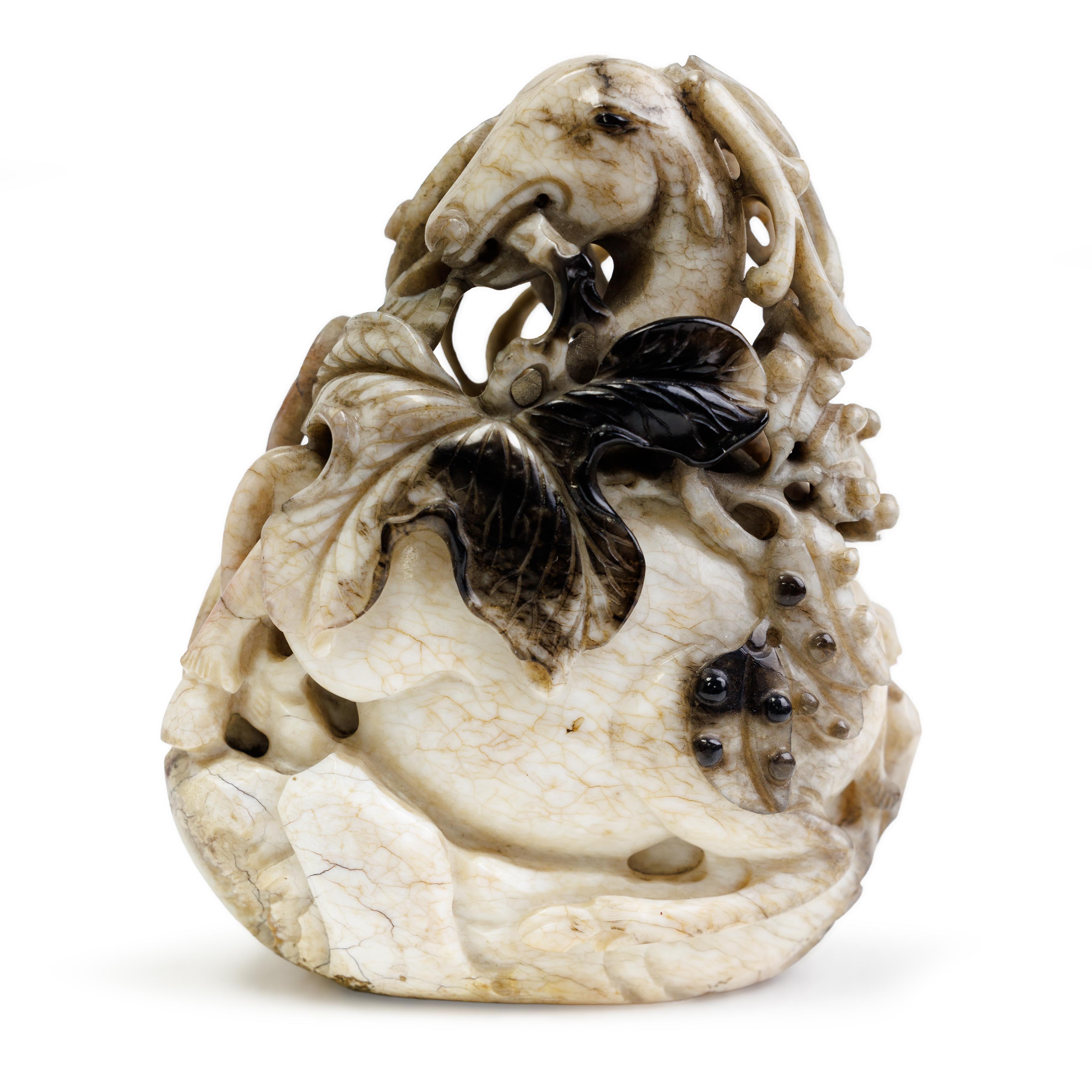 A Chinese mottled chicken-bone, black and russet jade carving of a deer and phoenix Ming/Qing dy... - Image 2 of 2