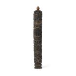 A Chinese rhinoceros horn needle case Qing dynasty, early 19th century Elaborately carved with ...