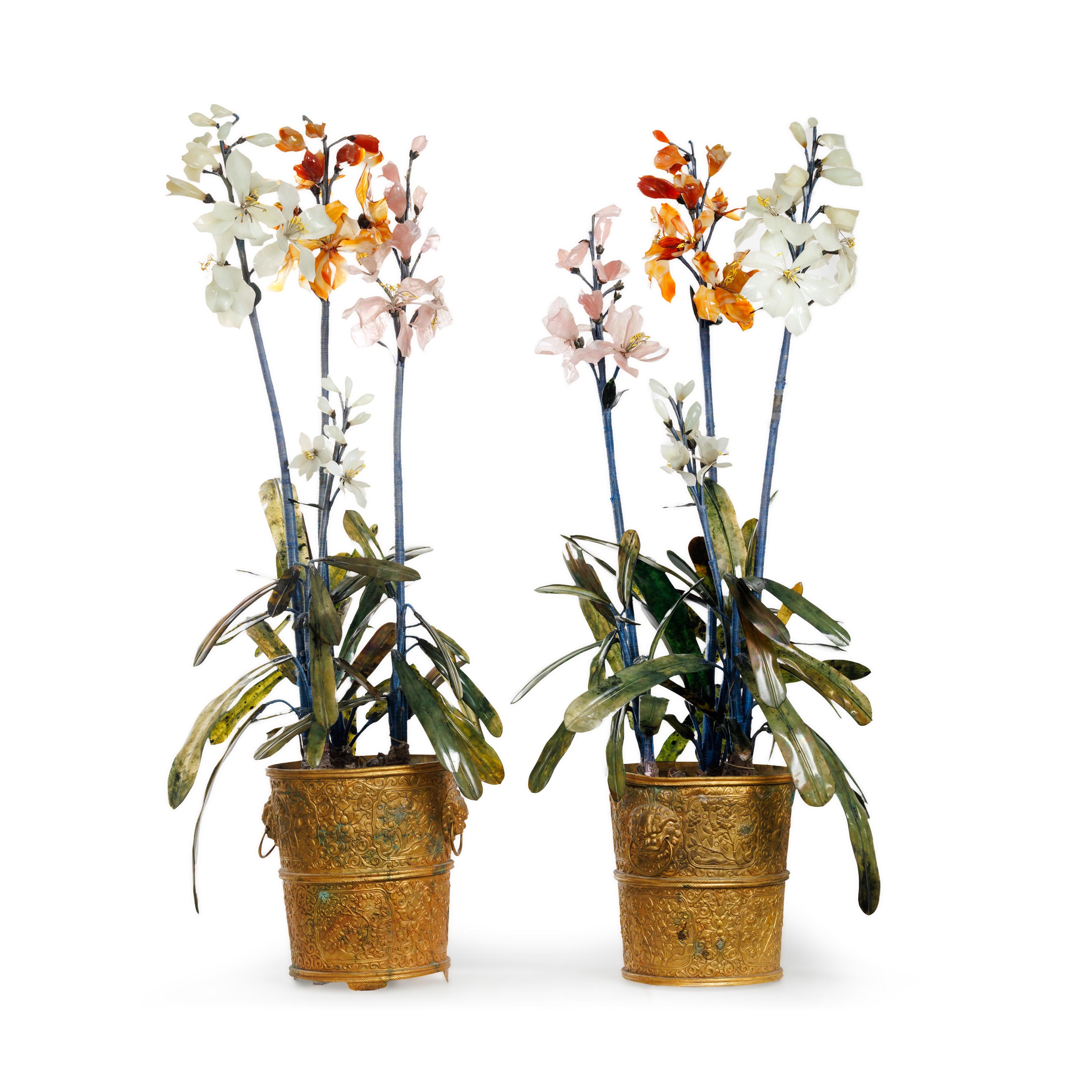 A pair of massive and impressive Chinese hardstone orchids in gilt-bronze jardinières Qing dynas...