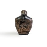 An unusual Thai silver-inlaid bronze snuff bottle and stopper 19th century The flattened balust...