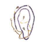 A Chinese amethyst and rock crystal court necklace, chao zhu 20th century Formed of 108 amethys...