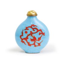 A Chinese painted enamel cinnabar-red and turquoise 'dragons' snuff bottle 20th century The fla...