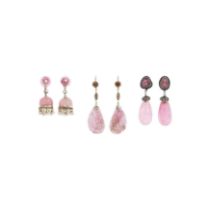 Three pairs of Chinese pink tourmaline earrings 20th century one with a teardrop shaped polishe...