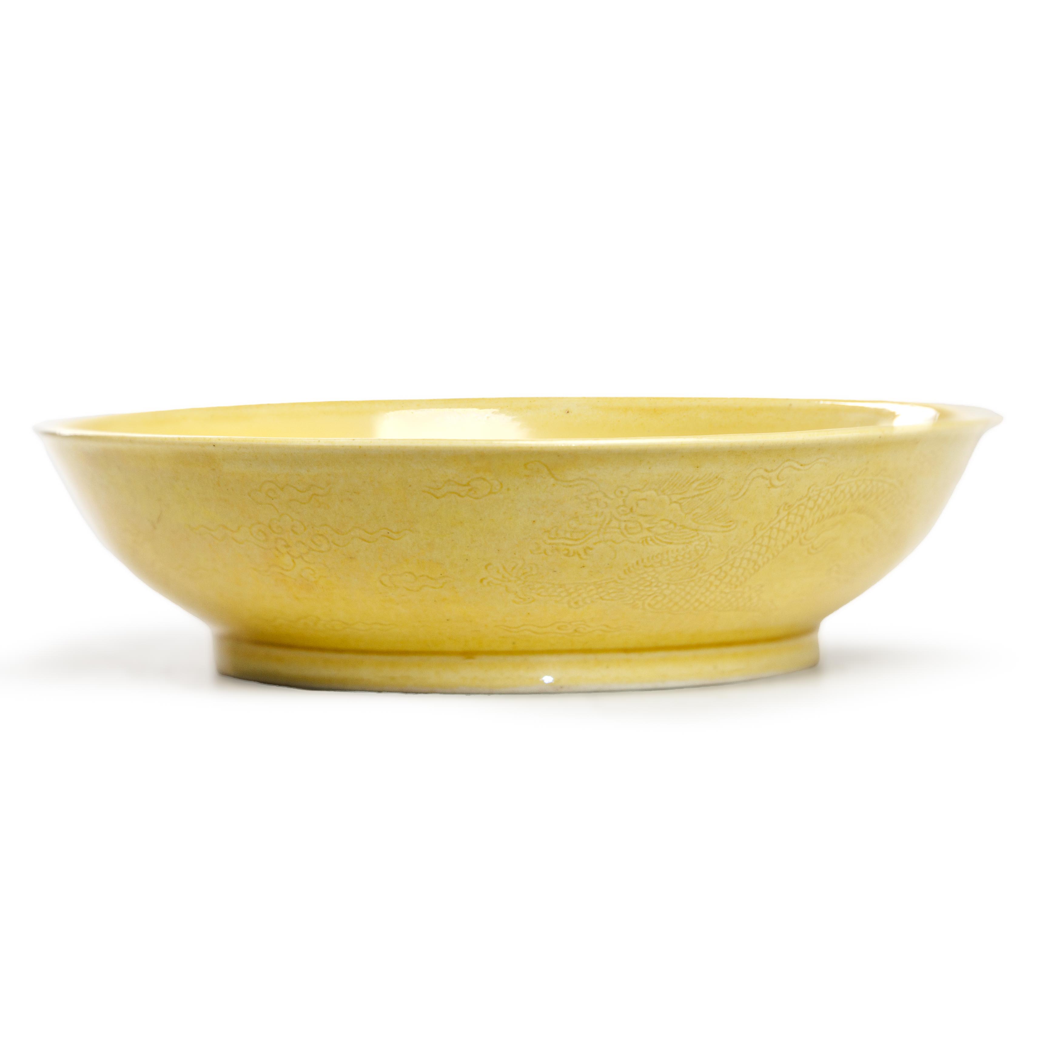 A Chinese yellow glazed 'dragon' dish Qing dynasty, Daoguang mark and period The deep dish with... - Image 7 of 7