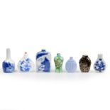 Six Chinese porcelain and one glass snuff bottle 20th century Comprising: three blue and white ...