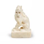 A small Chinese carved marble lion Tang dynasty Seated on a rectangular plinth, the beast carve...