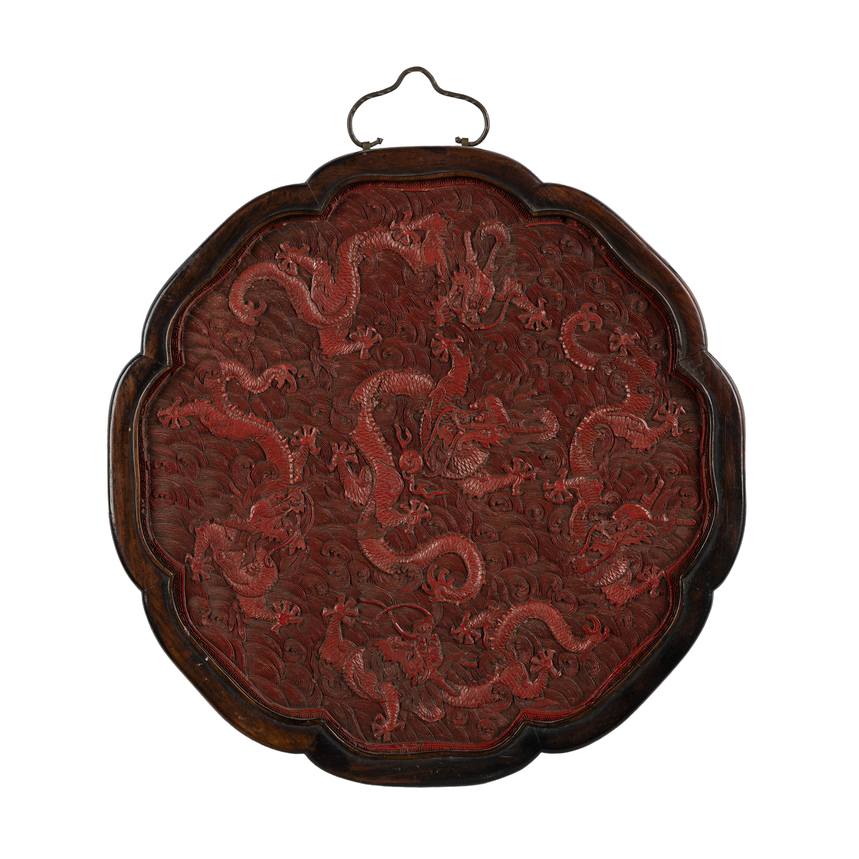 A Chinese carved cinnabar lobed 'dragon' plaque Mid Qing dynasty Finely carved with five dragon...