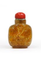 A large Chinese carved agate snuff bottle Late Qing dynasty The well-hollowed bottle carved fro...