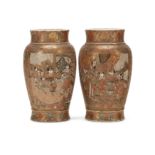 A pair of Japanese Satsuma baluster vases Meiji period, early 20th century Each decorated with...